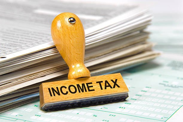 Home income tax marked on rubber stamps